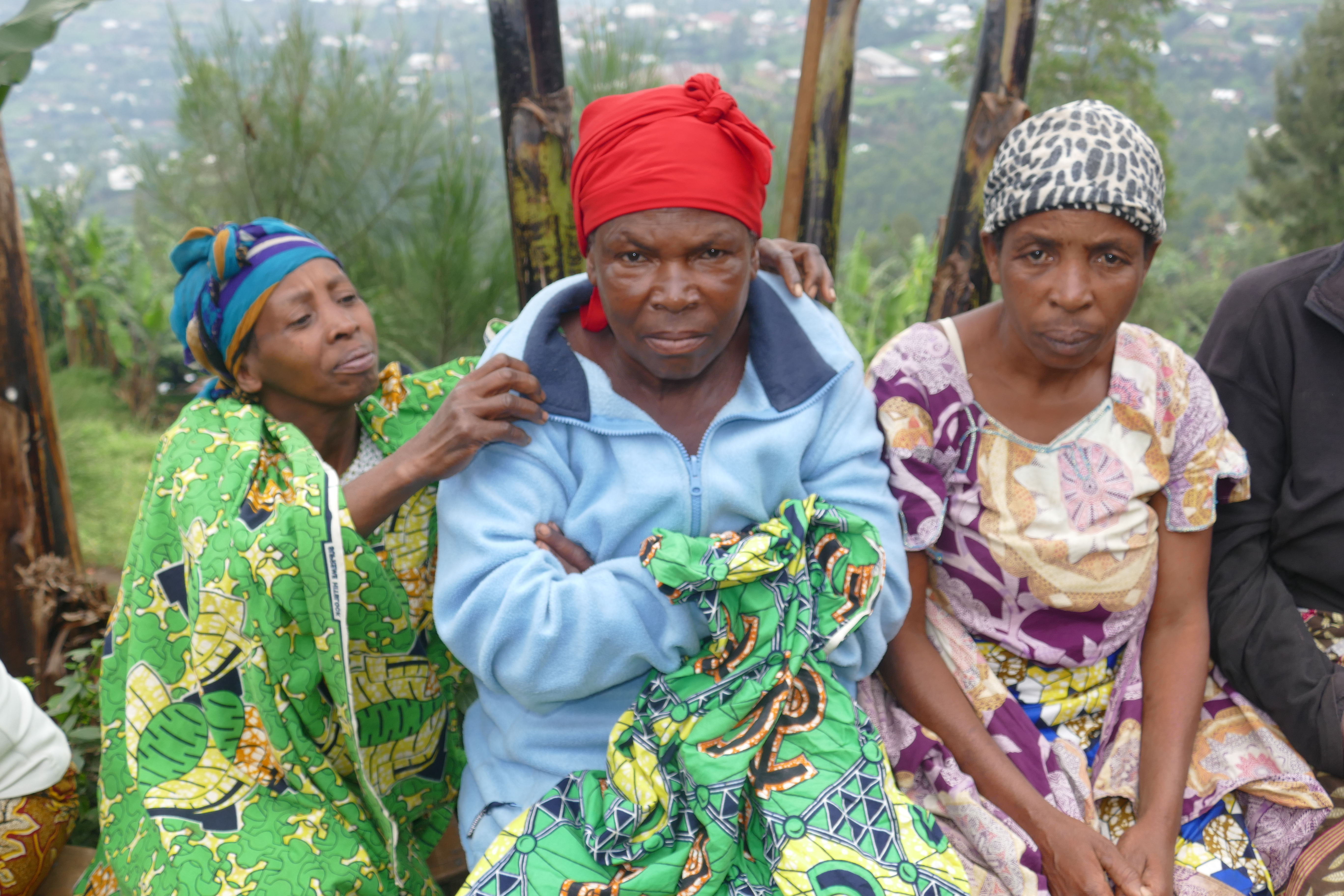 Women in DRC look into the camera